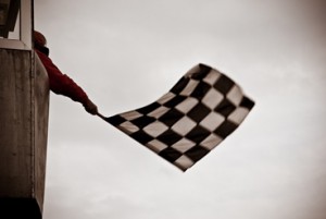 Man waving checkered Flag